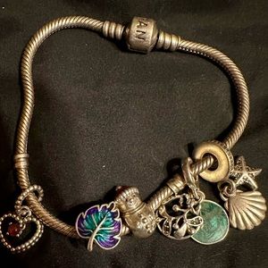 Pandora Bracelet. 7.5 inch wrist. With charms.